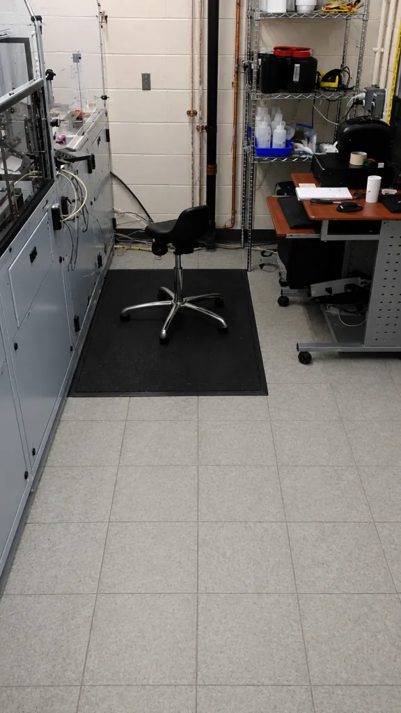 Installation of SDT Static Dissipative Tile Flooring in industrial lab weigh room